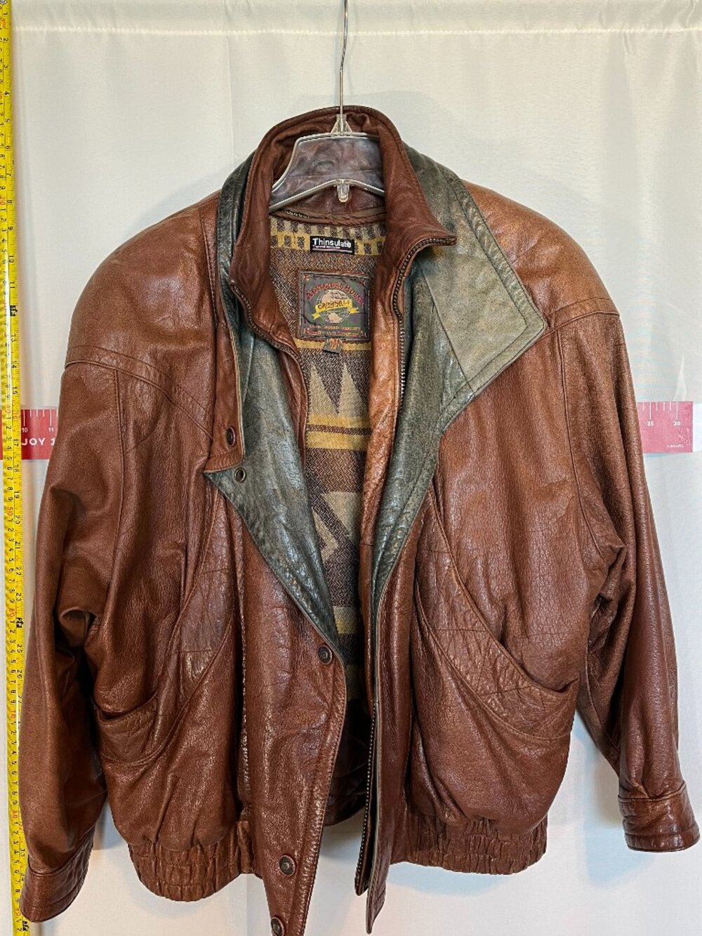 Brown leather bomber jacket